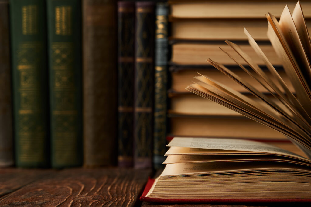 stack of books on bookshelf, close up. education learning concep stack of books on bookshelf, close up. education learning concep